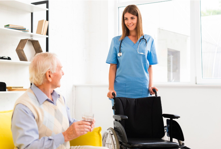 Nursing taking care of old women with smile with wheelchair